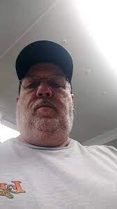 MARK L.